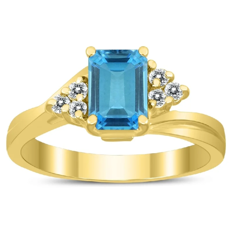 7X5MM Blue Topaz and Diamond Twist Ring in 10K Yellow Gold