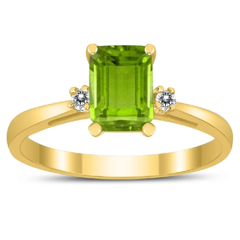 Emerald Cut 7X5MM Peridot and Diamond Three Stone Ring in 10K Yellow Gold