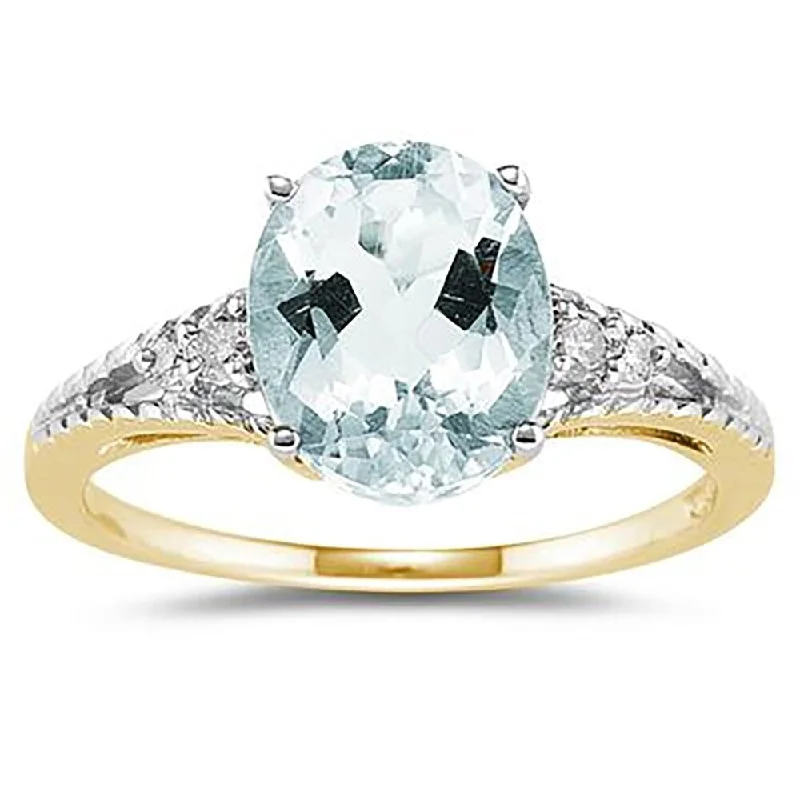 Oval Cut Aquamarine & Diamond Ring in 14k Yellow Gold