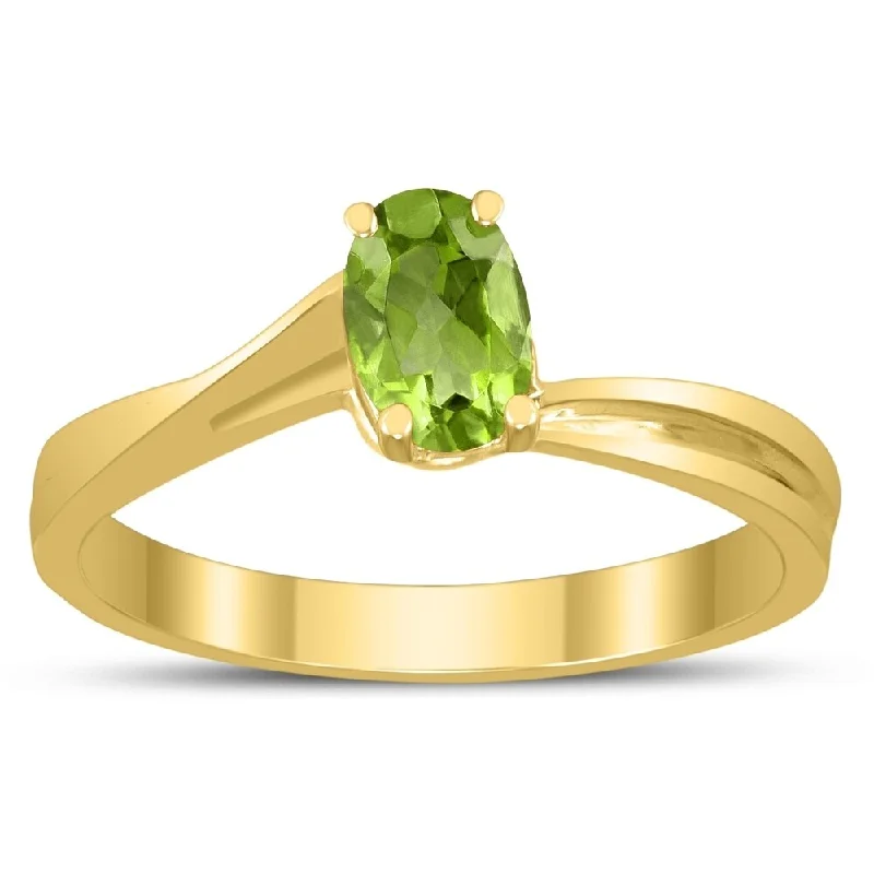 Solitaire Oval 6X4MM Peridot Gemstone Twist Ring in 10K Yellow Gold