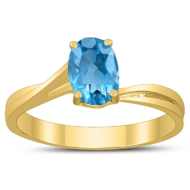 Solitaire Oval 7X5MM Blue Topaz Gemstone Twist Ring in 10K Yellow Gold