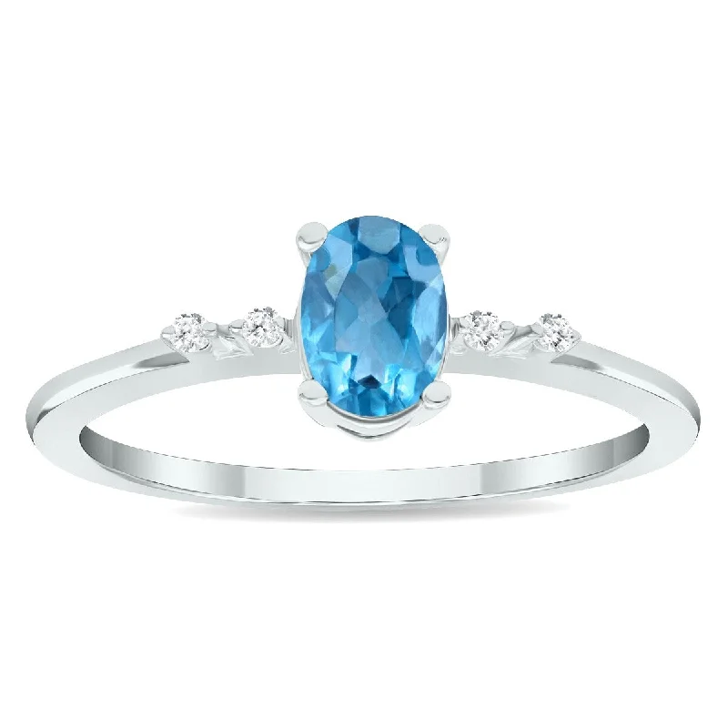 Women's Blue Topaz and Diamond Sparkle Ring in 10K White Gold