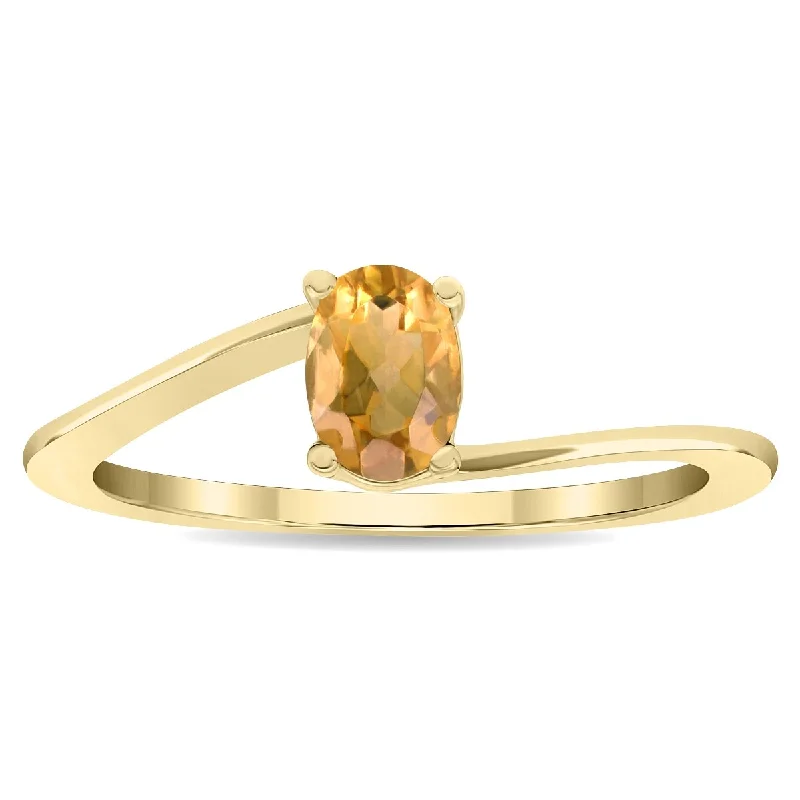 Women's Solitaire Oval Shaped Citrine Wave Ring in 10K Yellow Gold