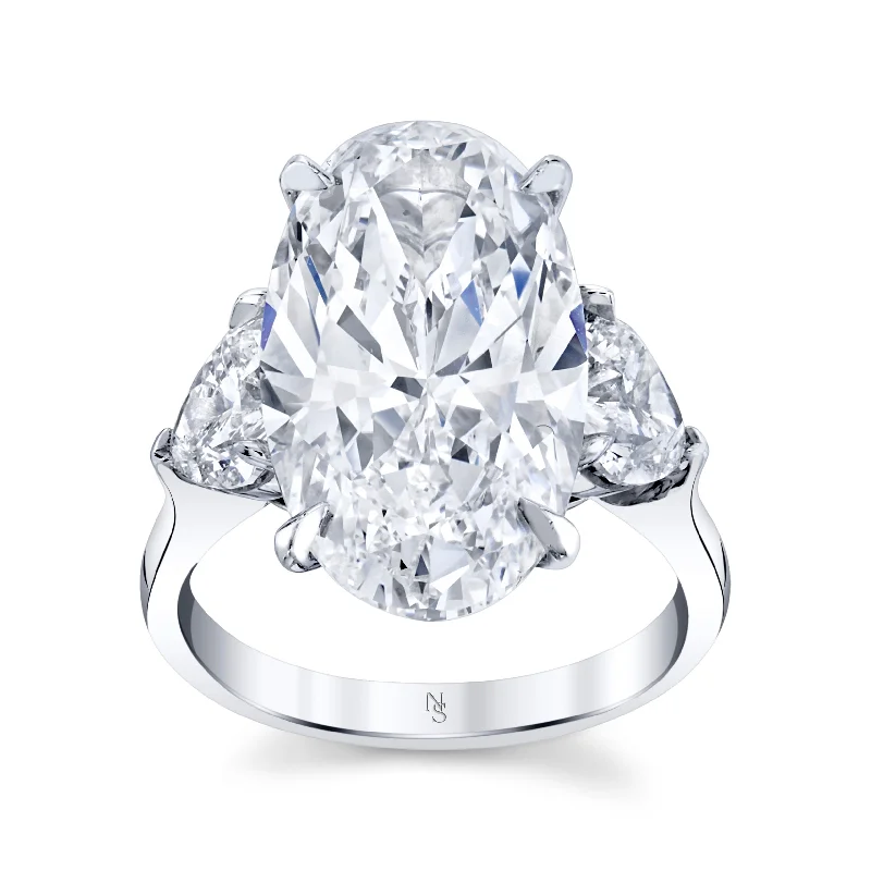 9.60 Carat Oval-Cut Diamond Ring with Heart Shape Sidestones